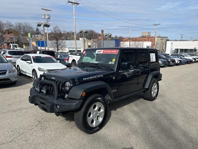 used 2015 Jeep Wrangler Unlimited car, priced at $21,861