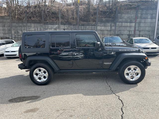 used 2015 Jeep Wrangler Unlimited car, priced at $21,861