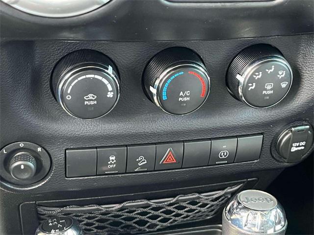 used 2015 Jeep Wrangler Unlimited car, priced at $18,599