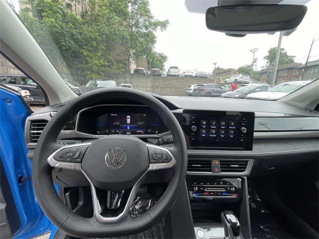 new 2025 Volkswagen Taos car, priced at $33,876