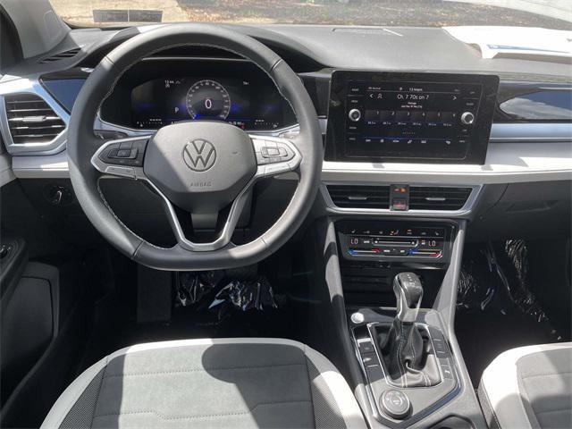 new 2025 Volkswagen Taos car, priced at $30,196