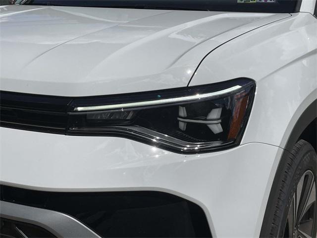 new 2025 Volkswagen Taos car, priced at $30,196