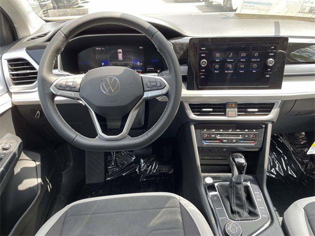 new 2025 Volkswagen Taos car, priced at $27,696