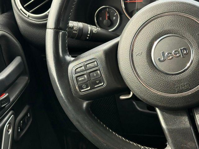 used 2015 Jeep Wrangler Unlimited car, priced at $18,991