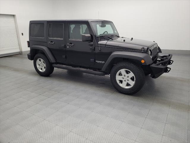 used 2013 Jeep Wrangler Unlimited car, priced at $20,195