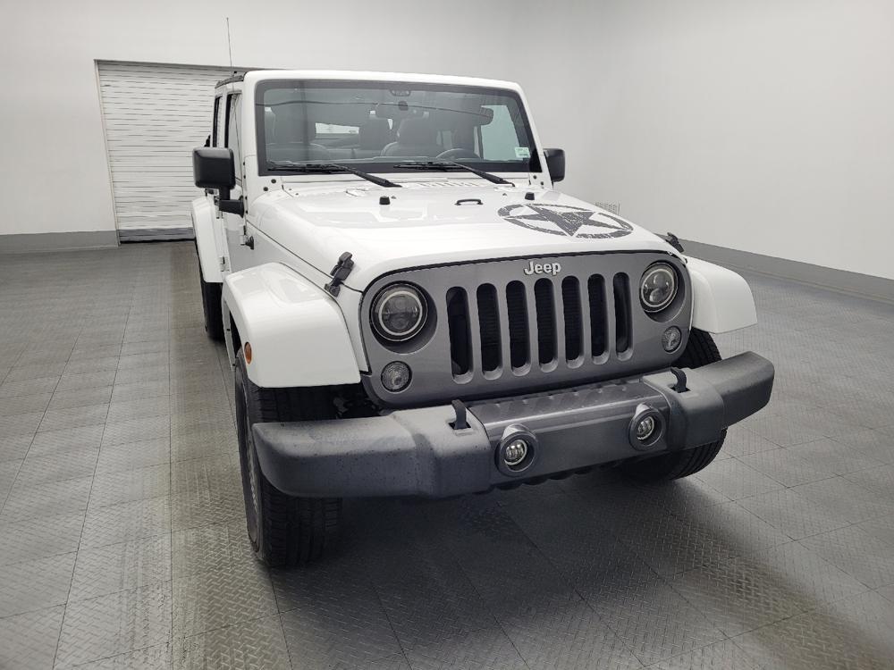 used 2015 Jeep Wrangler Unlimited car, priced at $21,595