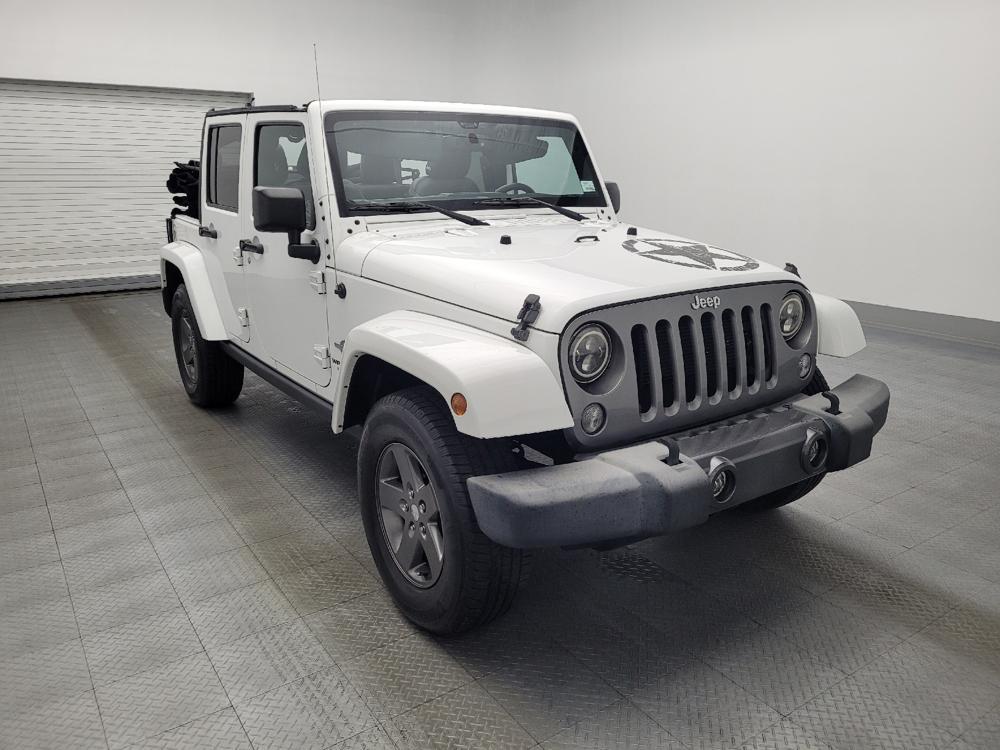 used 2015 Jeep Wrangler Unlimited car, priced at $21,595