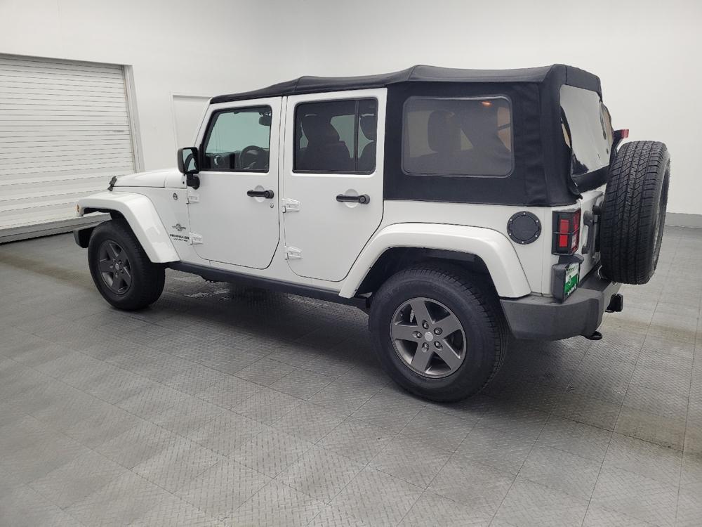 used 2015 Jeep Wrangler Unlimited car, priced at $21,595