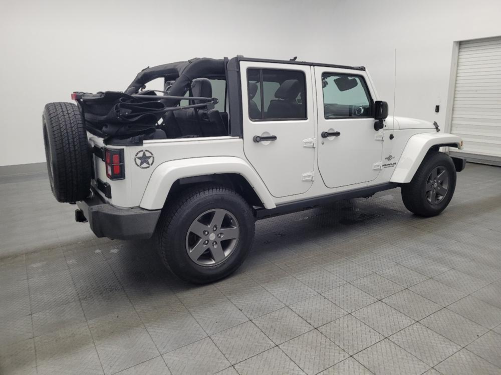 used 2015 Jeep Wrangler Unlimited car, priced at $21,595