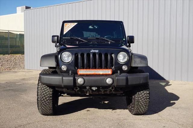 used 2015 Jeep Wrangler Unlimited car, priced at $24,484