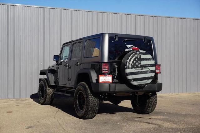 used 2015 Jeep Wrangler Unlimited car, priced at $24,484