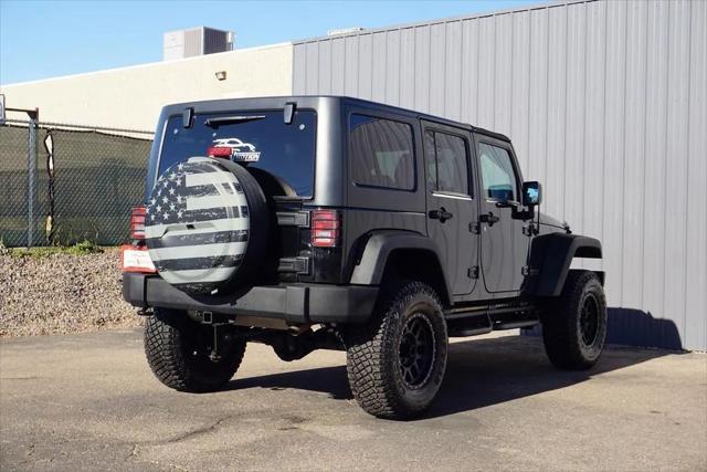 used 2015 Jeep Wrangler Unlimited car, priced at $24,484