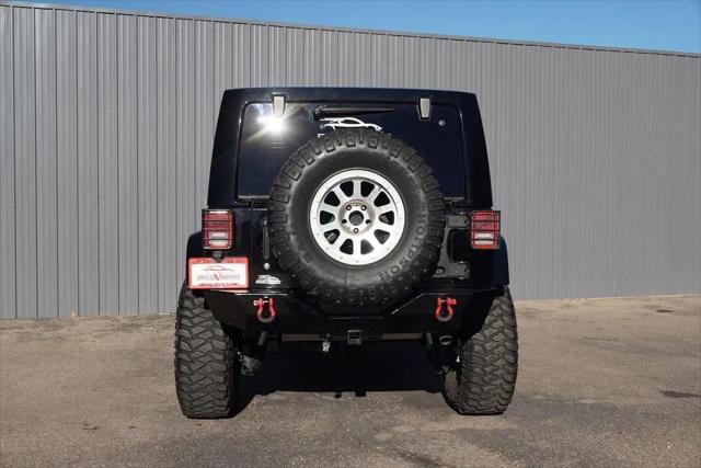 used 2013 Jeep Wrangler Unlimited car, priced at $22,984