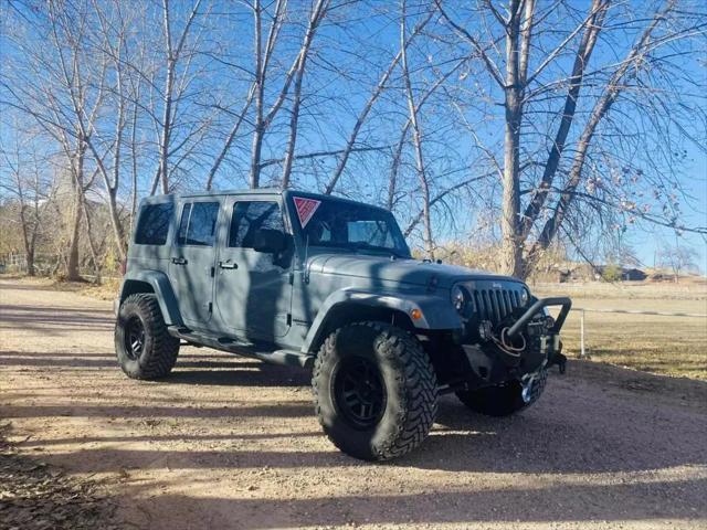 used 2014 Jeep Wrangler Unlimited car, priced at $18,984