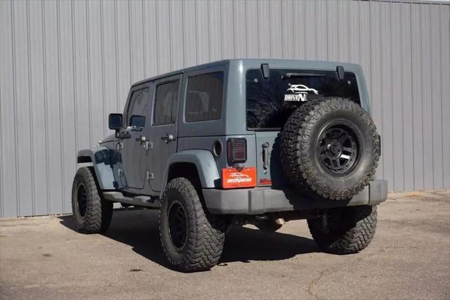 used 2014 Jeep Wrangler Unlimited car, priced at $18,984