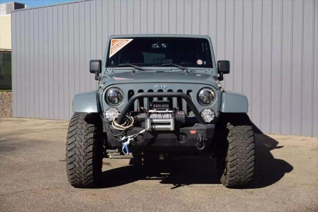 used 2014 Jeep Wrangler Unlimited car, priced at $18,984