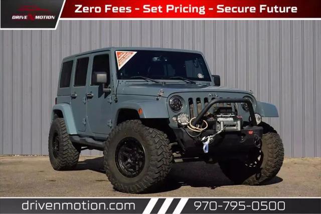 used 2014 Jeep Wrangler Unlimited car, priced at $18,984