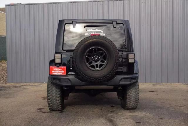 used 2015 Jeep Wrangler Unlimited car, priced at $17,971