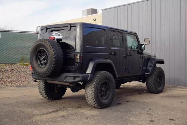 used 2015 Jeep Wrangler Unlimited car, priced at $17,971