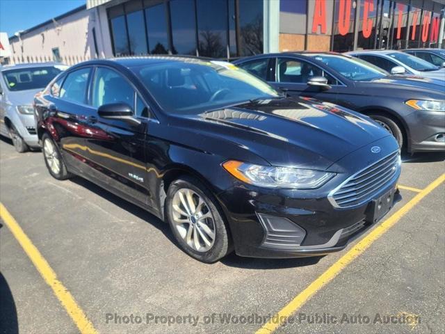 used 2019 Ford Fusion Hybrid car, priced at $6,950