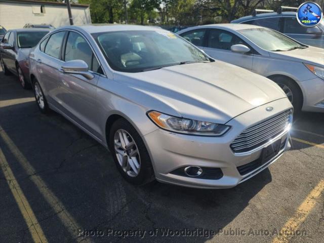 used 2016 Ford Fusion car, priced at $4,999