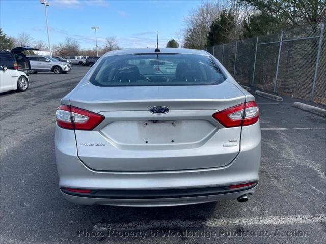 used 2016 Ford Fusion car, priced at $4,999