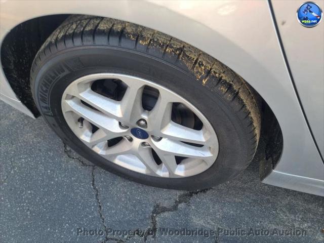 used 2016 Ford Fusion car, priced at $4,999