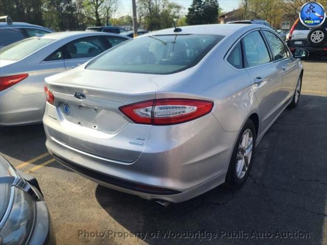used 2016 Ford Fusion car, priced at $4,999