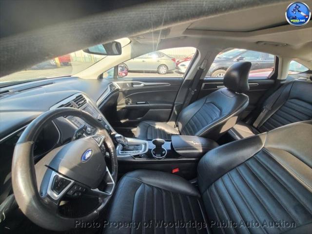 used 2016 Ford Fusion car, priced at $4,999