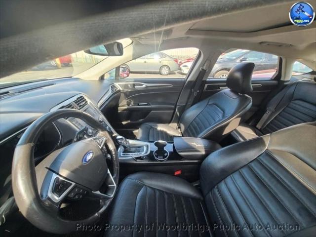 used 2016 Ford Fusion car, priced at $4,999