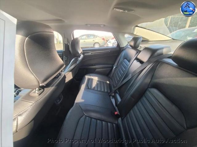 used 2016 Ford Fusion car, priced at $4,999