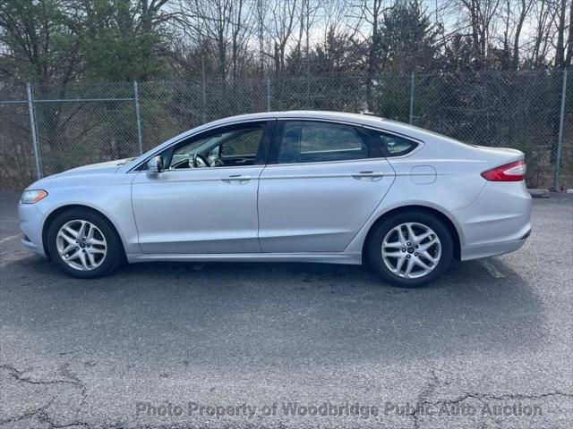 used 2016 Ford Fusion car, priced at $4,999
