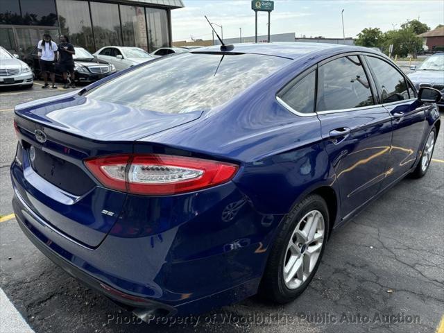 used 2016 Ford Fusion car, priced at $6,950