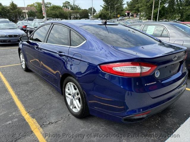 used 2016 Ford Fusion car, priced at $6,950