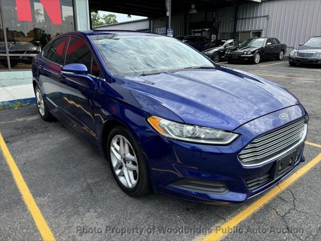 used 2016 Ford Fusion car, priced at $6,950