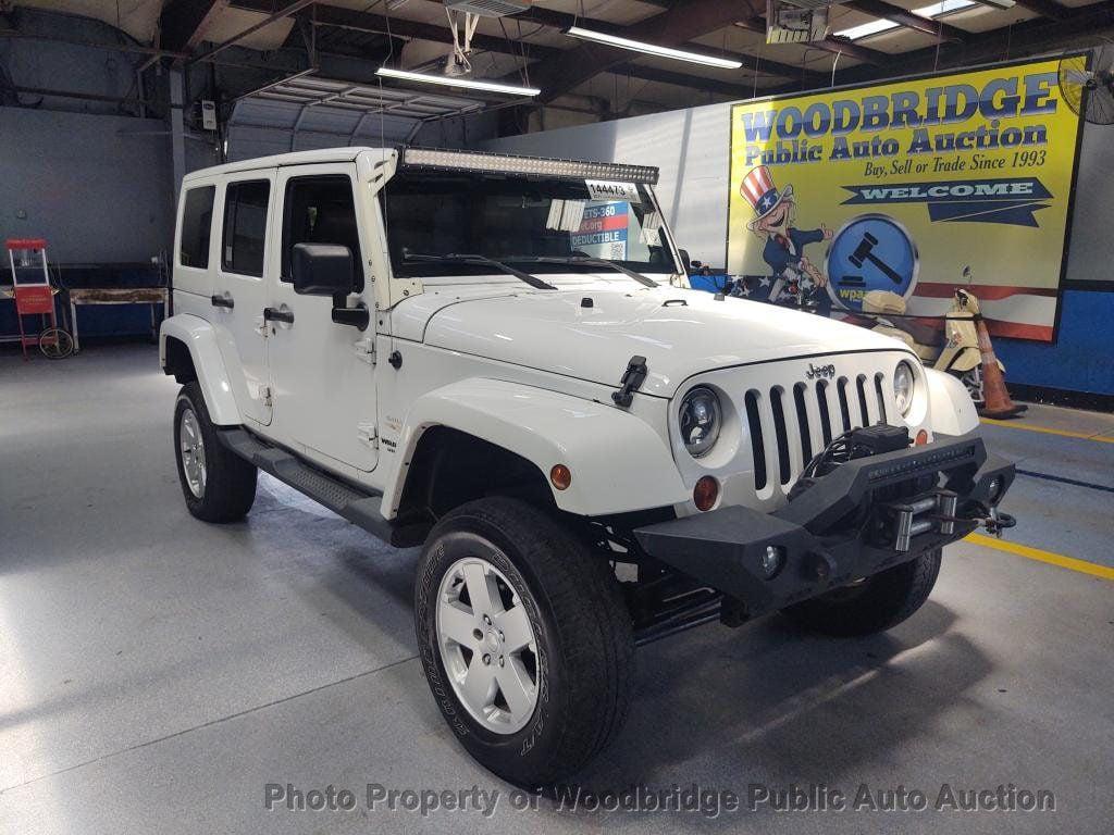 used 2011 Jeep Wrangler Unlimited car, priced at $7,450