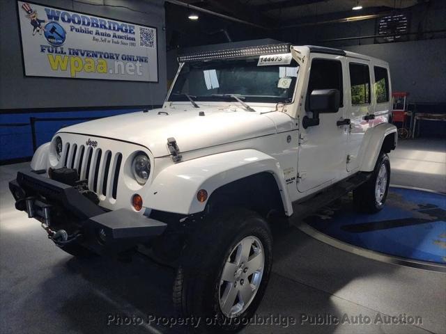 used 2011 Jeep Wrangler Unlimited car, priced at $8,450