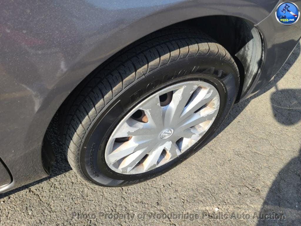 used 2014 Nissan Versa car, priced at $1,950