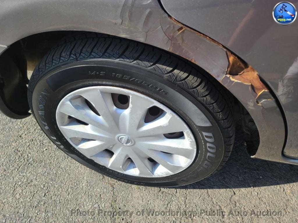 used 2014 Nissan Versa car, priced at $1,950