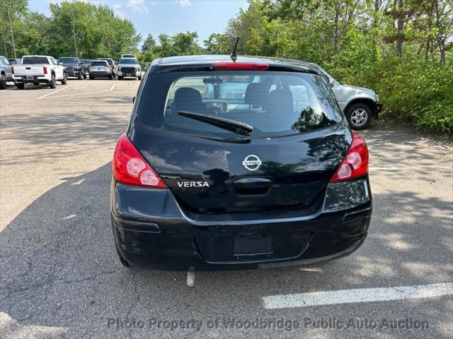 used 2011 Nissan Versa car, priced at $2,950
