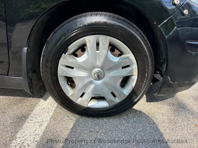 used 2011 Nissan Versa car, priced at $2,950