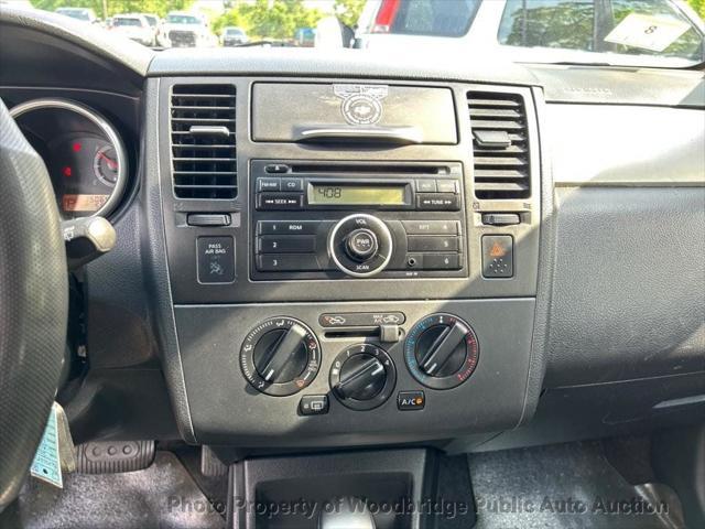 used 2011 Nissan Versa car, priced at $2,950