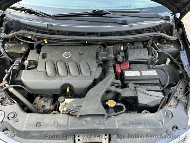 used 2011 Nissan Versa car, priced at $2,950
