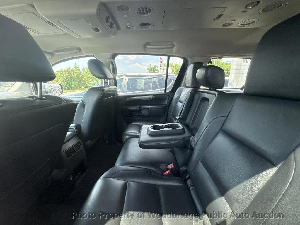 used 2013 Nissan Armada car, priced at $7,450