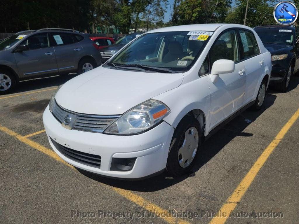 used 2009 Nissan Versa car, priced at $2,450
