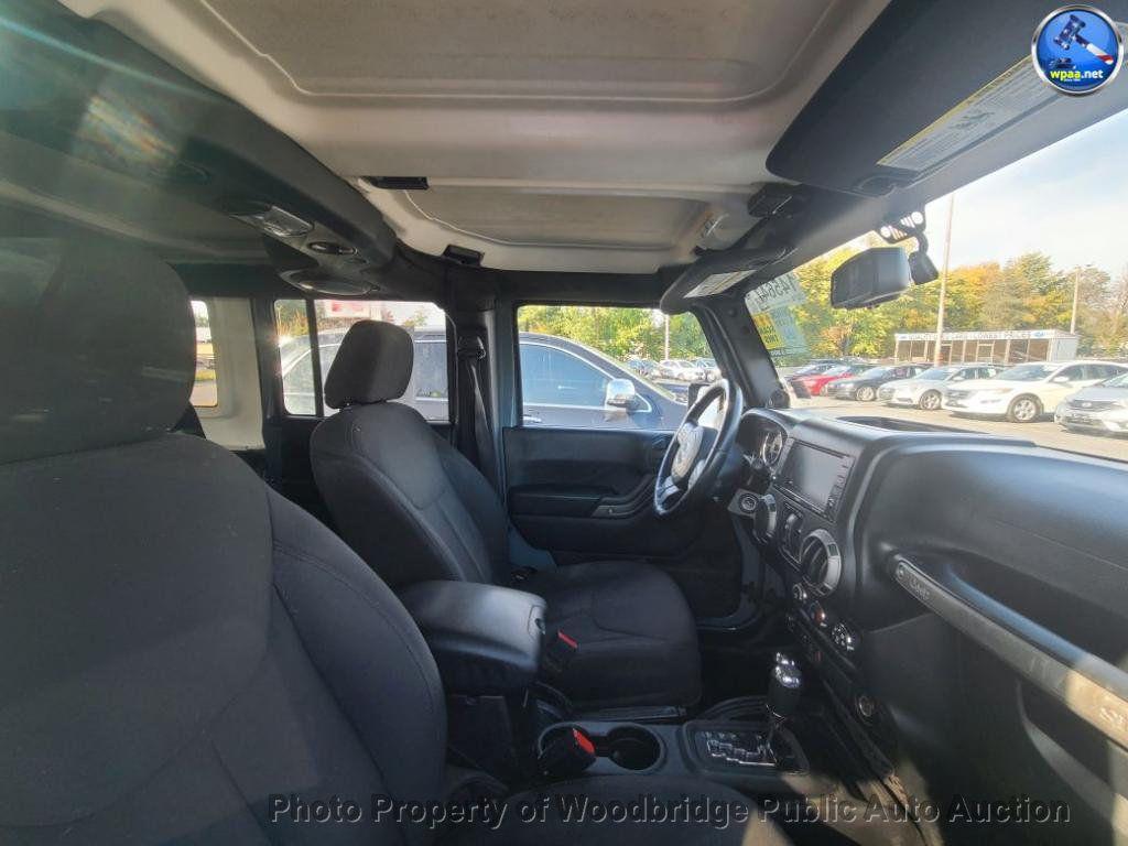 used 2014 Jeep Wrangler Unlimited car, priced at $12,950