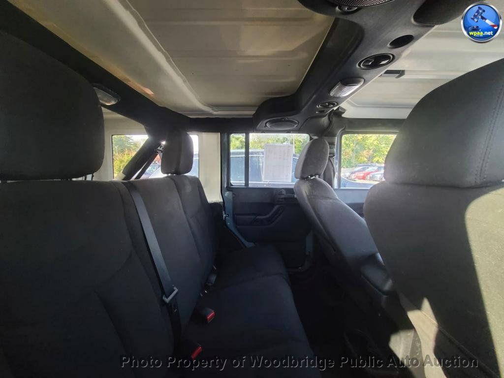 used 2014 Jeep Wrangler Unlimited car, priced at $12,950