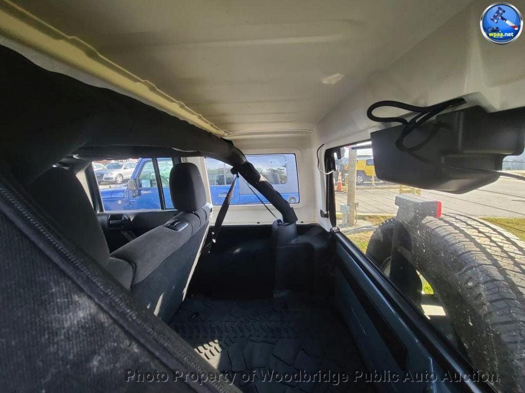 used 2014 Jeep Wrangler Unlimited car, priced at $12,950