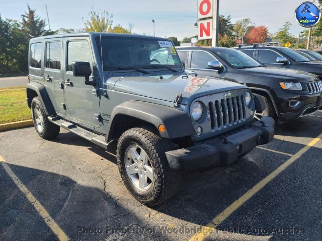 used 2014 Jeep Wrangler Unlimited car, priced at $12,950