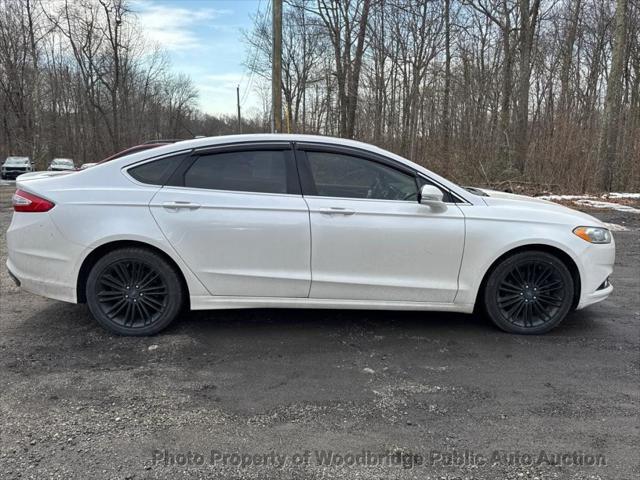 used 2015 Ford Fusion car, priced at $5,550